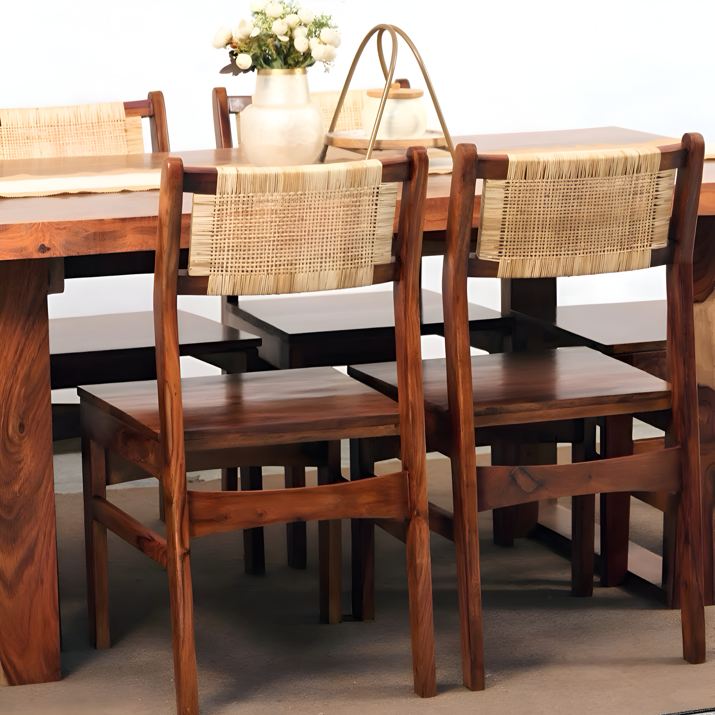 Discover the Nester live edge dining table with rattan chairs, made with sheesham wood. Buy our modern six-seater live edge dining set near you in Bangalore