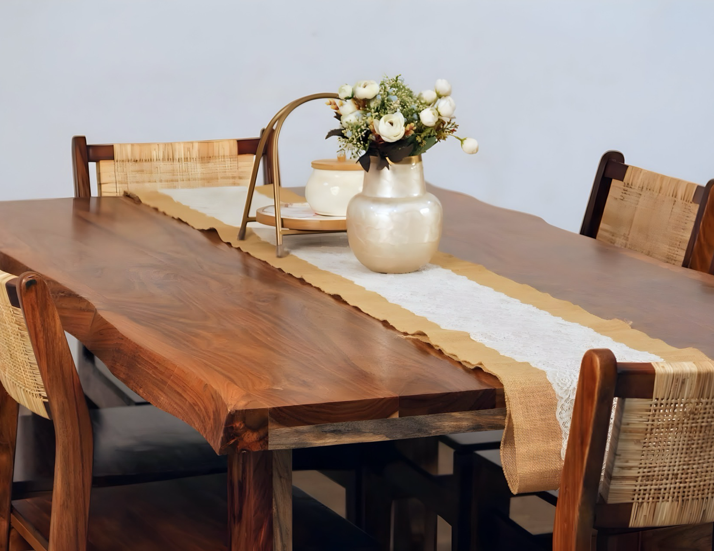 Discover the Nester live edge dining table with rattan chairs, made with sheesham wood. Buy our modern six-seater live edge dining set near you in Bangalore