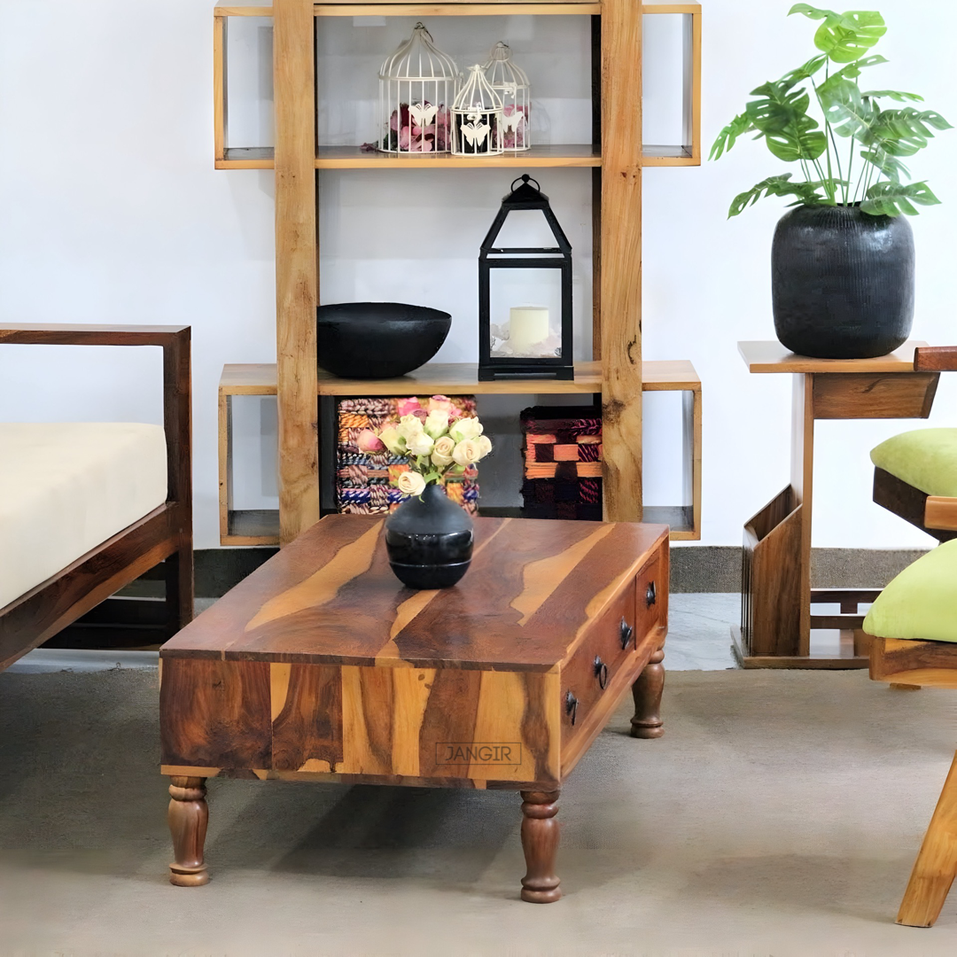 Elevate your living room with our stylish low coffee table near you in Bangalore. Made from sheesham wood, this center table designed with drawers that magically make messes disappear. Get yours now!