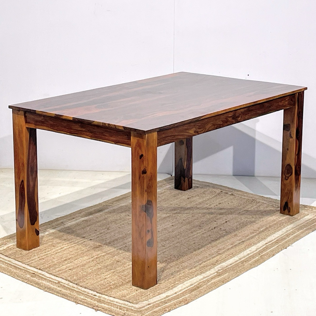 Elevate your dining room with our Apple Dining Table, made from Sheesham wood. Buy durable & low price four and six-seater Dining table near you in Bangalore